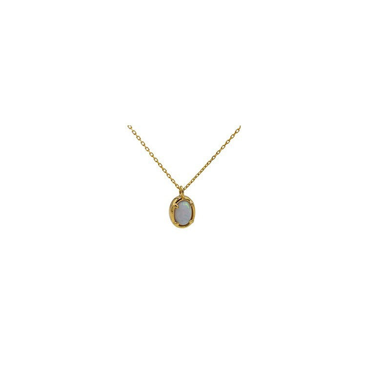 Gold necklace with a pendant on a white background