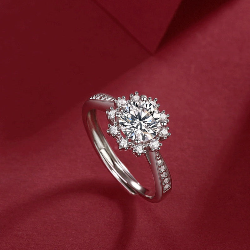 Diamond ring on a red fabric background