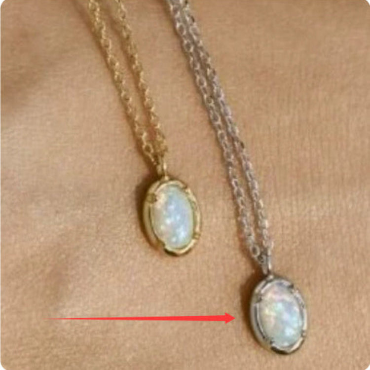 Two necklaces with opal pendants on a beige background